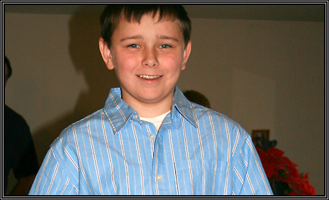 Ben ... trying on his Christmas swag ... 2006