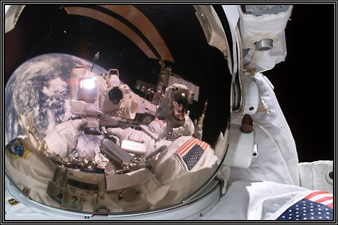 Discovery astronaut Mike Fossum took a fantastik picture of himself while on a spacewalk ... July 8, 2006 ... nice reflection in his helmet ... Discovery astronaut Mike Fossum took a fantastik picture of himself while on a spacewalk ... July 8, 2006 ... nice reflection in his helmet ...