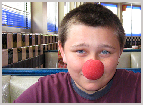 072607 ... Ben at Portillo's ... with his Shoe Carnival clown nose ...  