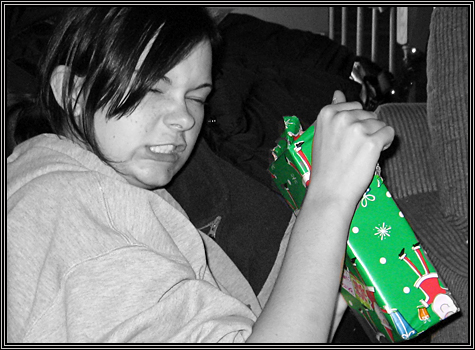 Too much to drink the night before makes the wrapping paper very very difficult to remove in the AM ... Brittni (hehe hugg) ... December 25, 2007 ... 