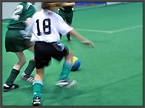 More from the last indoor soccer game ... Alexis is Number 7 ... she's the goalie half of the game ...  