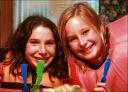 Alexis and Natalie eat dinner ... July 2008 ,,, Camp Nawakwa ...